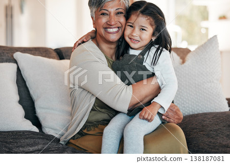 Portrait, love and grandmother with girl on sofa together for bonding, connection and care in living room of home. Happy family, woman and child on couch with happiness for relaxing, weekend and face Portrait, love and grandmother with girl on sofa together for bonding, connection and care in living room of home. Happy family, woman and child on couch with happiness for relaxing, weekend and face 138187081