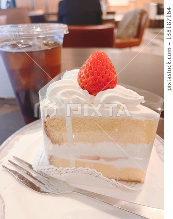 Strawberry shortcake and drink at a cafe Strawberry shortcake and drink at a cafe 138187164
