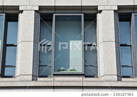 A scene of flowers placed in a bay window of a building in Nakanoshima, Osaka. A scene of flowers placed in a bay window of a building in Nakanoshima, Osaka. 138187361