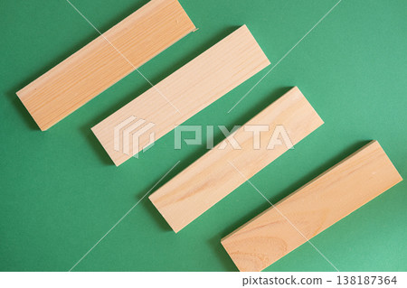 Simple background of wooden boards on a green background 138187364