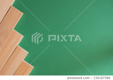 Simple background of wooden boards on a green background Simple background of wooden boards on a green background 138187366
