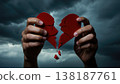 Broken heart in the hands - divorce concept. photo with red heart. 138187761