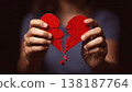 Broken heart in the hands - divorce concept. photo with red heart. 138187764