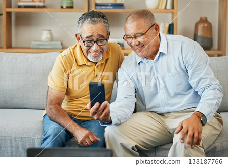 Friends, phone and senior men on sofa smile for selfie, profile picture and video call at home. Retirement, home and mature people on smartphone for internet, social media and bonding in living room 138187766