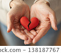 Broken heart in the hands - divorce concept. photo with red heart. 138187767