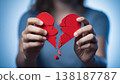Broken heart in the hands - divorce concept. photo with red heart. 138187787