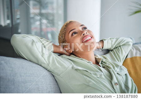 Woman, relax and living room on a couch with a smile and rest with thinking and happy memory. Home, female person and calm in a house with future dream and peace in a lounge with freelancer break 138187880