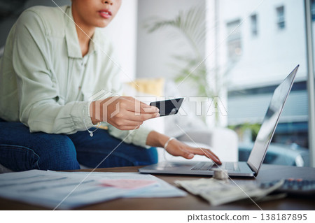 Woman, credit card and bills with laptop, budget and e commerce and fintech, information and internet banking at home. Online shopping, finance and money to pay and savings with customer experience Woman, credit card and bills with laptop, budget and e commerce and fintech, information and internet banking at home. Online shopping, finance and money to pay and savings with customer experience 138187895