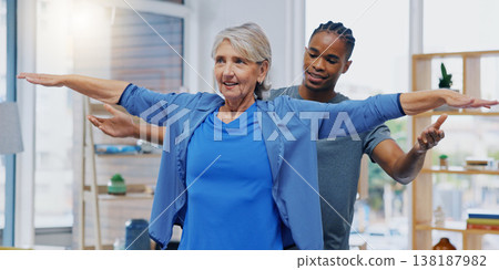 Elderly woman, nurse and rehabilitation or stretching exercise in a nursing home for fitness. Happy senior female patient with a therapist man for healing, health and physiotherapy for arms and body 138187982