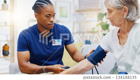 Caregiver, black man or old woman with blood pressure test consulting in hospital to monitor heart wellness. Healthcare, hypertension consultation or medical nurse with sick patient for examination Caregiver, black man or old woman with blood pressure test consulting in hospital to monitor heart wellness. Healthcare, hypertension consultation or medical nurse with sick patient for examination 138188135