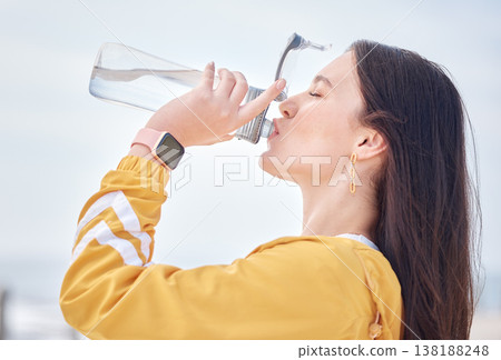 Woman, drinking water and outdoor with bottle to relax, rest and detox body in training, exercise or running. Drink, liquid and healthy hydration in summer morning with athlete and self care 138188248