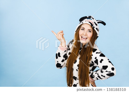 Woman wearing pajamas cartoon pointing 138188310