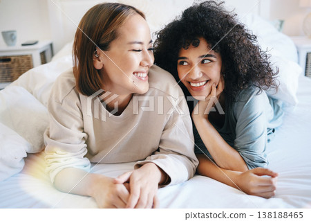 Lesbian, couple and bedroom for connection or happiness talking, communication or lgbtq. Gay women, connection together and unique queer identity love in apartment, relax or pride in home for morning Lesbian, couple and bedroom for connection or happiness talking, communication or lgbtq. Gay women, connection together and unique queer identity love in apartment, relax or pride in home for morning 138188465