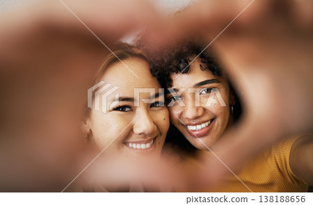 Lesbian couple, smile and heart with hands, portrait and closeup for romance, bonding and love and support for relationship. Happy people, together and solidarity for pride, lgbtq and hope for peace Lesbian couple, smile and heart with hands, portrait and closeup for romance, bonding and love and support for relationship. Happy people, together and solidarity for pride, lgbtq and hope for peace 138188656
