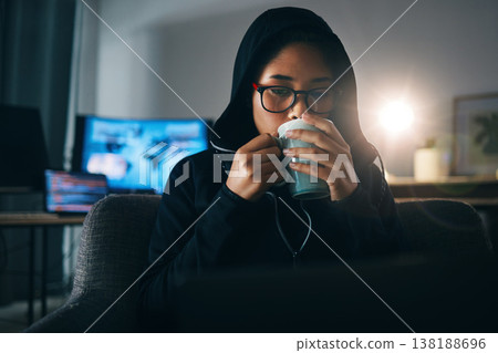 Hacker woman, coffee and night for coding, thinking and ideas for cybersecurity, data phishing and ransomware. Programmer, dark room and sofa to drink matcha for it scam, software or research on web 138188696