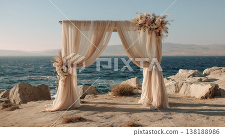 Elegant beach wedding arch with floral decoration romantic seaside ceremony backdrop at sunset 138188986
