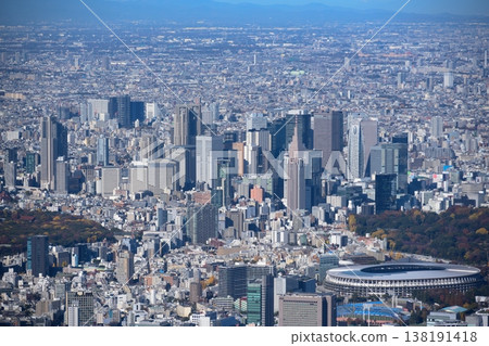 Aerial view of Tokyo's skyscrapers and the National Stadium. Aerial view of Tokyo's skyscrapers and the National Stadium. 138191418