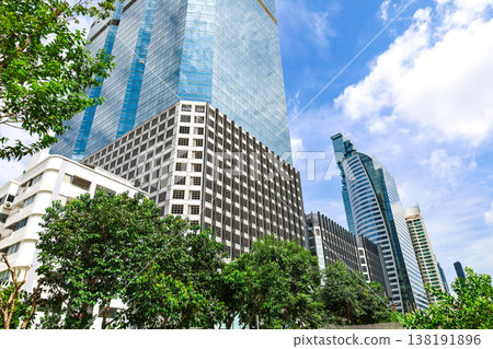 A cityscape with greenery and buildings 138191896