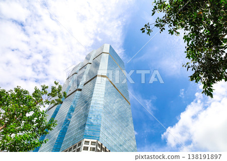 Landscape of the office town looking up at a skyscraper Landscape of the office town looking up at a skyscraper 138191897