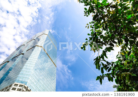 Landscape of the office town looking up at a skyscraper Landscape of the office town looking up at a skyscraper 138191900
