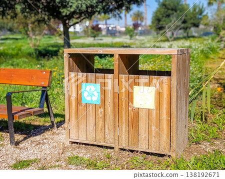 Park Bench with Recycling Bins for Paper and Plastic 138192671