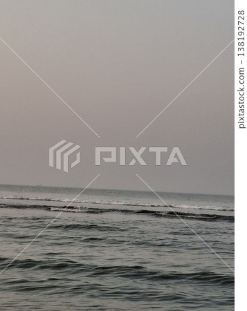 Calm Ocean Horizon At Dusk With Gentle Waves And Muted Pastel Sky Minimal Seascape 138192728