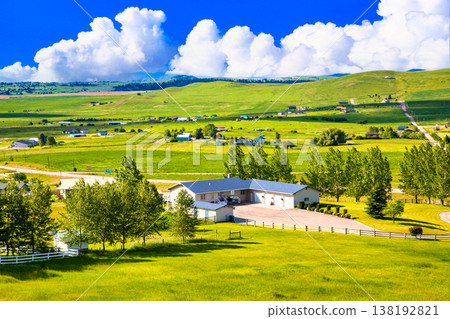A composite image of Montana's beautiful countryside and cumulonimbus clouds. A composite image of Montana's beautiful countryside and cumulonimbus clouds. 138192821