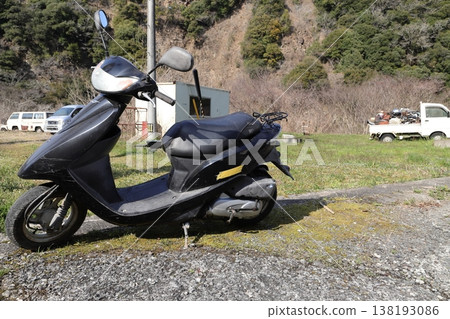 Old motorized bicycle Old motorized bicycle 138193086