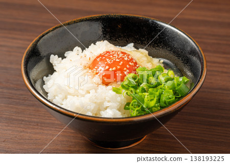 Egg over rice: A simple yet popular Japanese staple. Egg over rice: A simple yet popular Japanese staple. 138193225