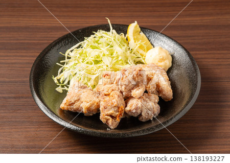 Fried chicken: A popular dish that's crispy on the outside and juicy on the inside. Fried chicken: A popular dish that's crispy on the outside and juicy on the inside. 138193227