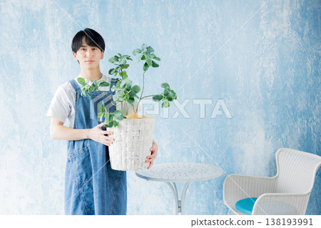 Men with foliage plants Men with foliage plants 138193991