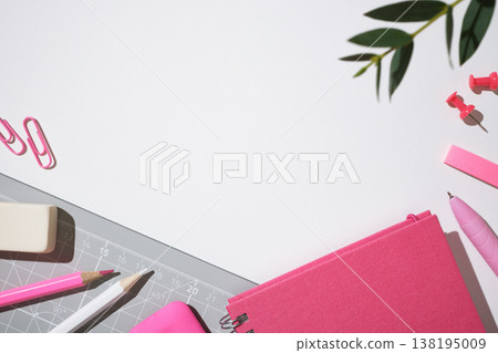 Creative workspace with cutting mat, pink notebook, pencils, pen and stationery on white desk. Copyspace. Creative workspace with cutting mat, pink notebook, pencils, pen and stationery on white desk. Copyspace. 138195009