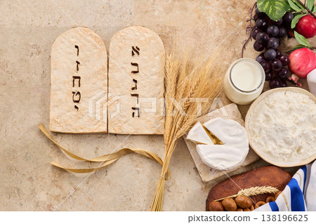 Shavuot holiday symbols and traditional foods representing dairy and wheat Shavuot holiday symbols and traditional foods representing dairy and wheat 138196625