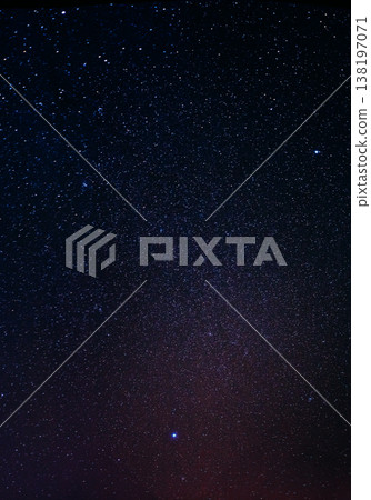 Beautiful night sky filled with stars and soft purple galaxy glow Beautiful night sky filled with stars and soft purple galaxy glow 138197071