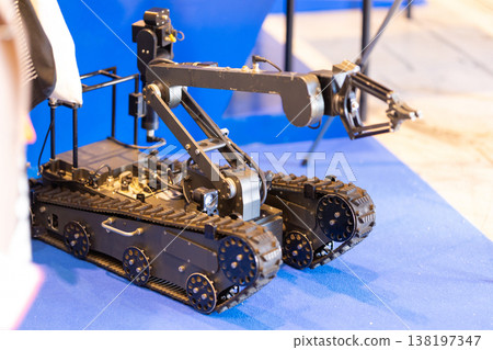 Unmanned ground vehicle using robotic arm for security Unmanned ground vehicle using robotic arm for security 138197347