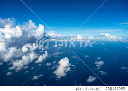 Aerial view of fluffy clouds over the Pacific Ocean in Polynesia Aerial view of fluffy clouds over the Pacific Ocean in Polynesia 138198065