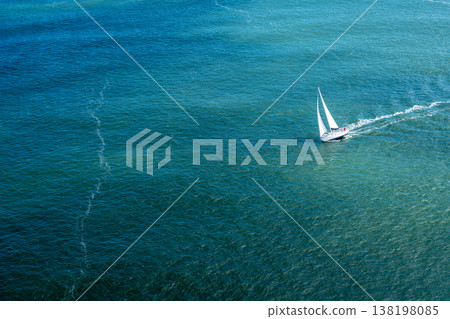 Sailboat gliding through the bay near Golden Gate Bridge, San Francisco Sailboat gliding through the bay near Golden Gate Bridge, San Francisco 138198085
