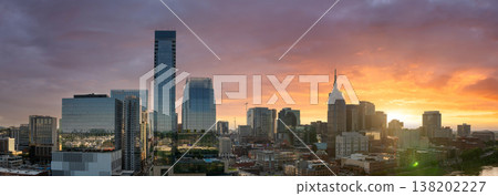 Downtown of Nashville, Tennessee with modern skyline at sunset. Vibrant urban atmosphere in American city. Downtown of Nashville, Tennessee with modern skyline at sunset. Vibrant urban atmosphere in American city. 138202227