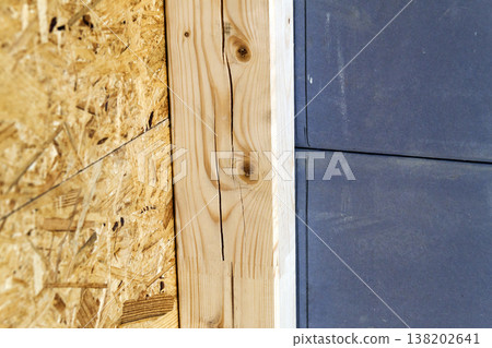 Close up detail of house construction wooden wall elements. Interior frame renovation work 138202641