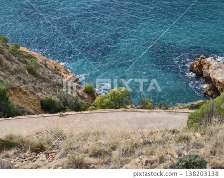 Coastal natural scene, Vivid coastal environment featuring vibrant turquoise waters and rugged rocks 138203138