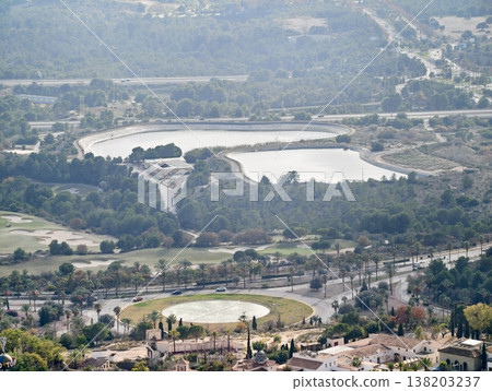 Aerial view of farmland and water structures, Survey of irrigation basins amidst agricultural land 138203237
