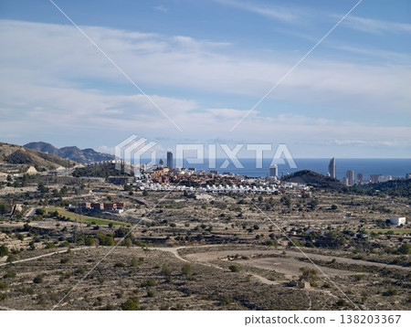 Seaside cityscape visuals, Scenic seashore skyline with modern glass buildings and sunny weather 138203367