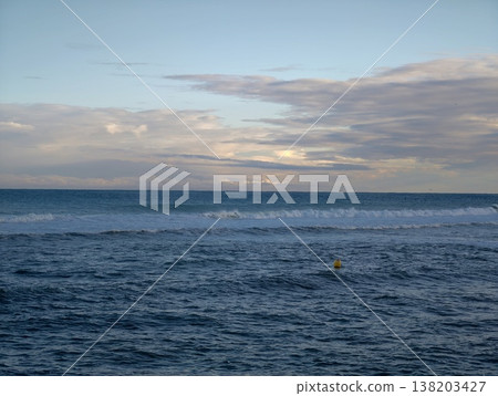 Single buoy dances on rough sea surface, Solitary marker amidst stormy waters and atmospheric phenomena 138203427