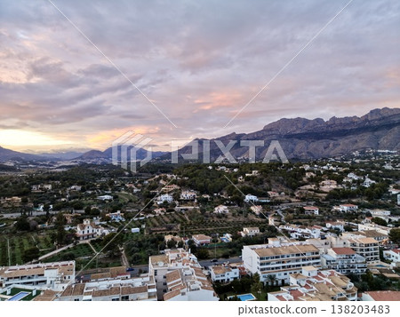 Serene seaside townscape captured from above, Panoramic aerial perspective of tranquil shoreline communities 138203483
