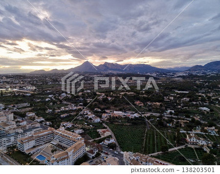 Evening village view, Serene coastal mountain settlement, Tranquil hamlet above tranquil bay Evening village view, Serene coastal mountain settlement, Tranquil hamlet above tranquil bay 138203501