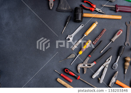 Equipment Hand Tools on Dark Background Equipment Hand Tools on Dark Background 138203846
