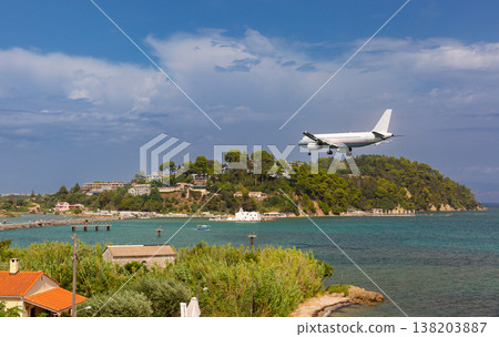 Passenger airplane above Mouse Island near Corfu Airport in Corfu, Greece Passenger airplane above Mouse Island near Corfu Airport in Corfu, Greece 138203887