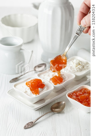 Cottage cheese with quince jam. Cottage cheese with quince jam. 138204314