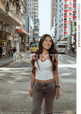 Asian Woman Smiling on Kennedy Town Street Hong Kong Asian Woman Smiling on Kennedy Town Street Hong Kong 138204523