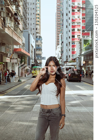 Asian Woman Smiling on Kennedy Town Street Hong Kong 138204525